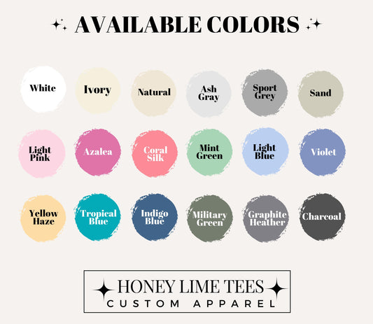 a collection of available colors for custom apparel, including white, ivory, natural, ash grey, sport grey, sand, light pink, azalea, coral silk, mint green, light blue, violet, yellow, tropical blue, indigo blue, military green, graphite charcoal, and charcoal.