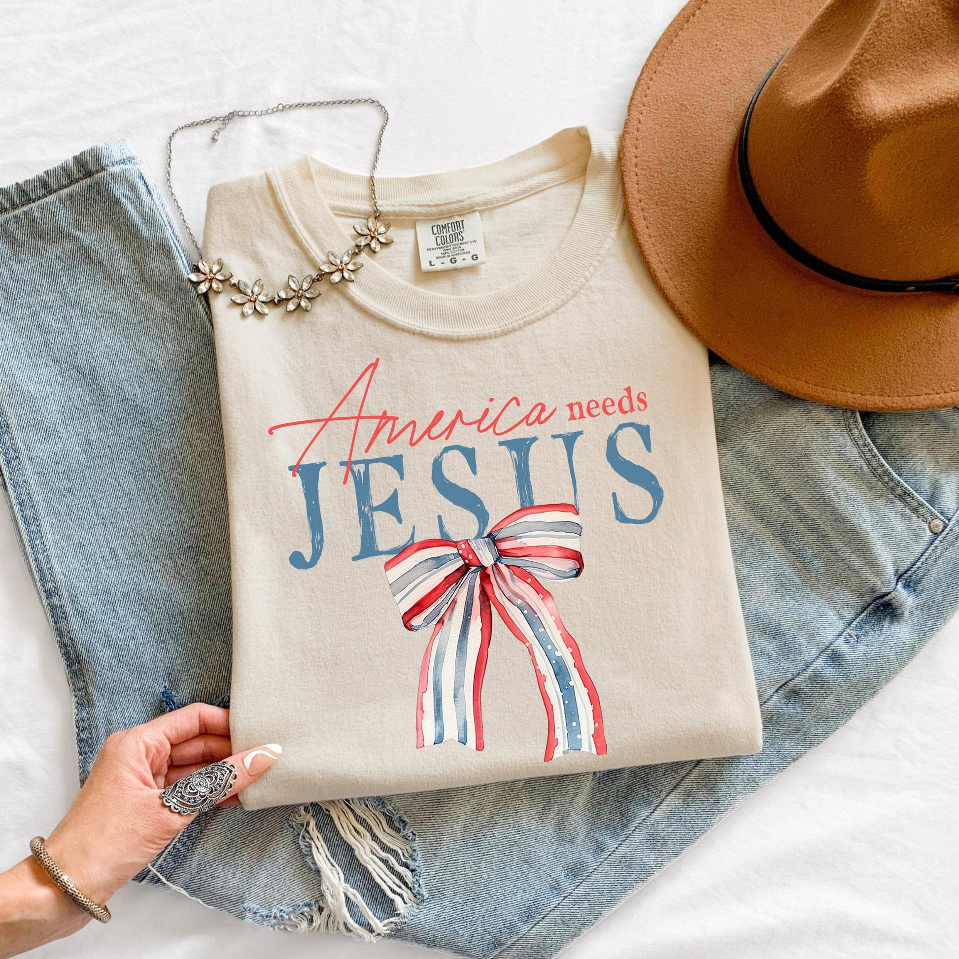 America Needs Jesus Shirt, Patriotic Christian Graphic Tee, Red White and Blue Bow T-Shirt, Fourth of July Faith Top, Religious USA Shirt