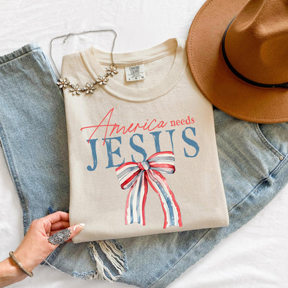 America Needs Jesus Shirt, Patriotic Christian Graphic Tee, Red White and Blue Bow T-Shirt, Fourth of July Faith Top, Religious USA Shirt
