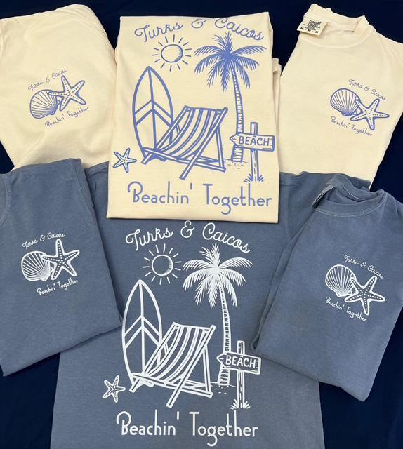 a collection of t-shirts and shirts featuring beach-themed designs, including palm trees, starfish, and beach chairs.